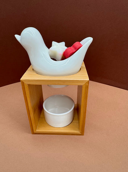 Bruleur oiseau blanc